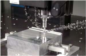 CNC milling machine cutting aluminium component - precision milling services Al Omda Doha Qatar