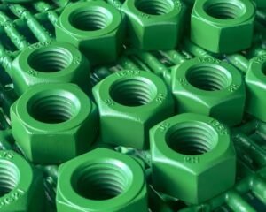 Xylan coated hex nuts in green fluoropolymer coating - Al Omda Technical Company machine shop Qatar